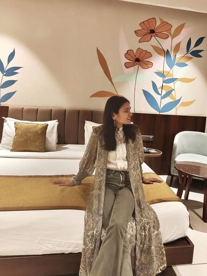 During a trip to Udaipur, I found inspiration everywhere, even in the beautiful mural of my hotel room. Travel always fills my creative well.