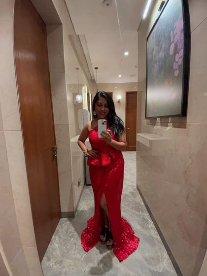 A quick mirror selfie before heading out to host a gala night. The right attire is part of setting the tone, and I always dress to match the elegance of the event.