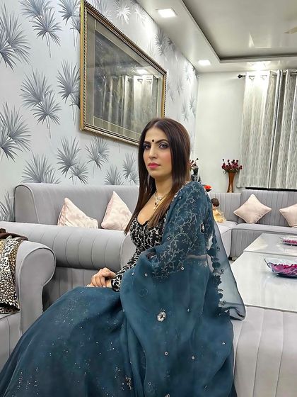 Book your party makeup. This client is ready for a cocktail party in her dark teal and black lehenga with a smokey eye.