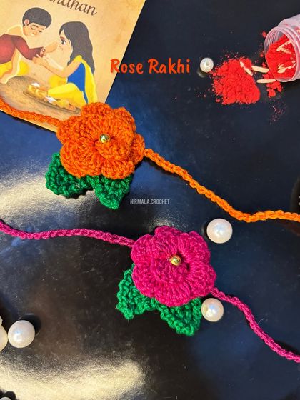 These beautiful rose rakhis are a floral delight. Available in bright orange and pink, they add an elegant and colorful touch to the Raksha Bandhan festival.