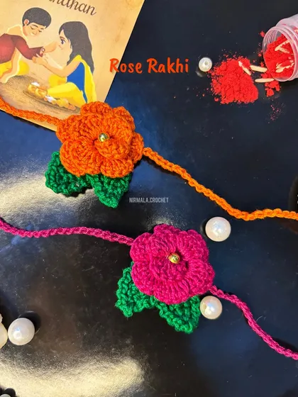 These beautiful rose rakhis are a floral delight. Available in bright orange and pink, they add an elegant and colorful touch to the Raksha Bandhan festival.