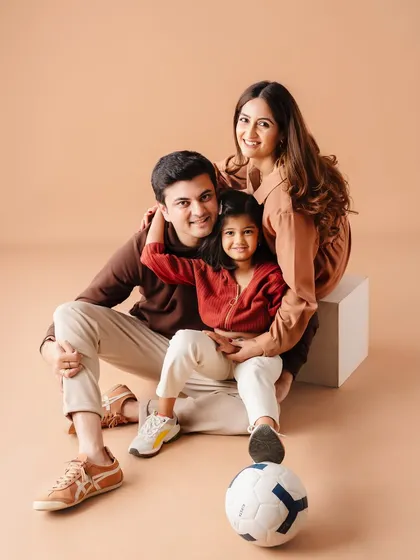 This is us. A family portrait that captures the joy and connection that is at the heart of everything I do. My work as a parenting coach is deeply rooted in my own experience as a mother, and these are the moments that fuel my passion for helping other families find their calm and build strong bonds.