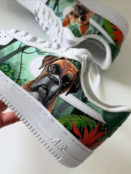 Yes, I can paint your best friend on your shoes! This was one of my most cherished recent projects, creating custom pet portraits on a pair of Nike Air Force 1s. I worked to capture the unique personality of this client's boxer and French bulldog, setting them against a lush jungle background. It’s a beautiful way to keep your furry friends with you on every step.