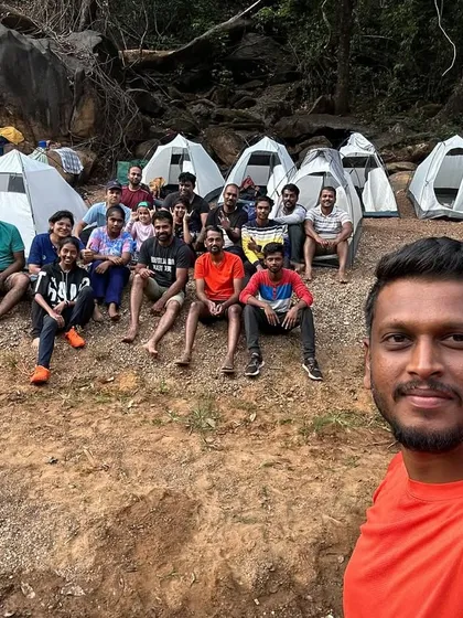 The adventure doesn't end when the sun goes down. Here's our group after setting up camp right next to a river. We share stories, look at the stars, and sleep to the sound of flowing water. This is the authentic camping experience I offer.