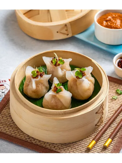 Beautifully crafted dim sum in a bamboo steamer for Moets Oh! Bao.