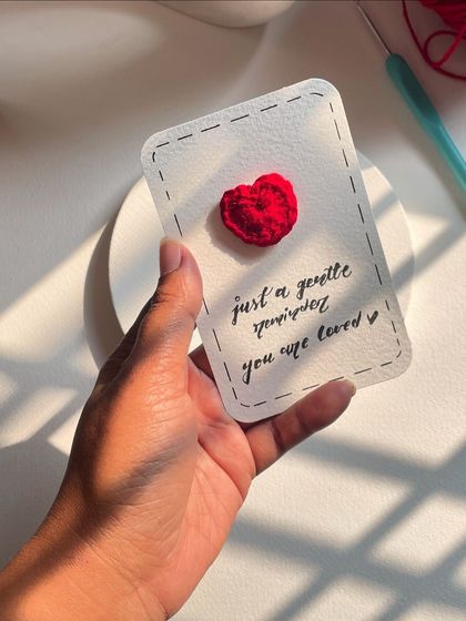 "Just a gentle reminder you are loved." A tiny crochet heart on a simple card. Sometimes we all need that little reminder.