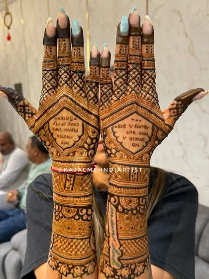 A special message from the bride's sister to the groom, beautifully written in henna. It reads, "Hey Mister, please take care of my sister."