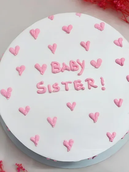 Another angle of the cute 'Baby Sister' cake.