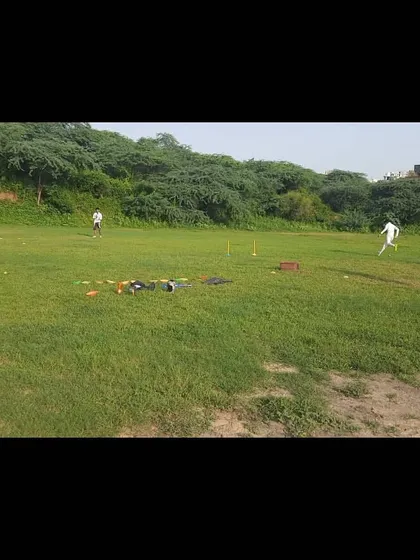 A wide view of a fielding drill setup. We utilize the entire ground to create dynamic, multi-station training environments that keep players moving and engaged.