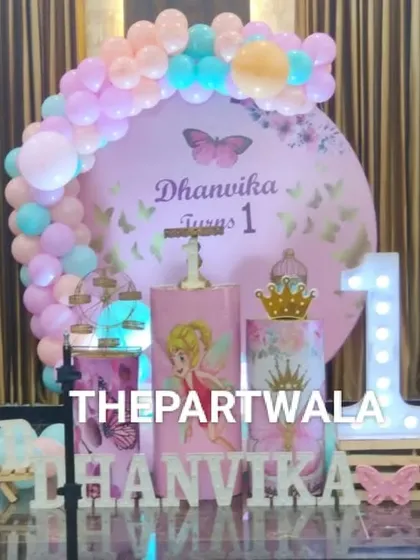 A lovely fairy and butterfly theme with pastel balloons and multiple character cutouts. The light-up "ONE" sign is a popular addition for first birthdays.