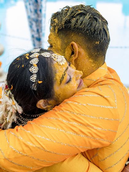 A candid embrace during our Haldi ceremony. His simple striped yellow kurta was the perfect match for my bright yellow saree, keeping the look cohesive and effortlessly joyful.