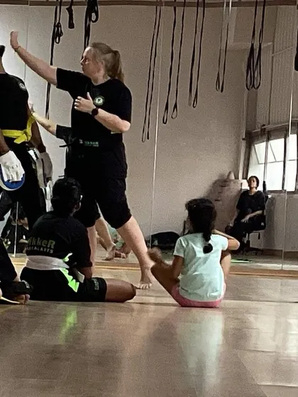 Building confidence one strike at a time. I demonstrate a technique while students watch and learn.
