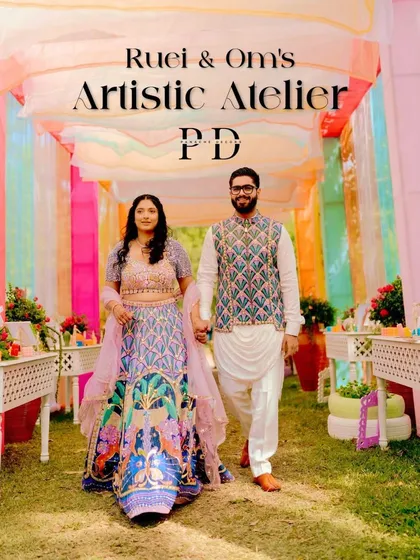 The couple's entrance at their 'Artistic Atelier' Haldi. The colorful draped tunnel and creative details set the stage for a one-of-a-kind celebration that reflected their personalities.