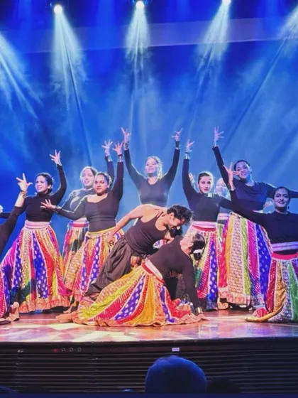 A powerful moment frozen in time from our Manch 2025 folk medley performance. This image captures the culmination of two months of dedicated training, teamwork, and passion that my students bring to the stage.