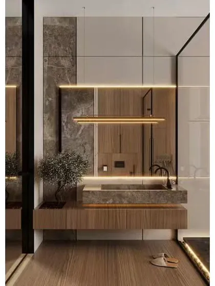 A luxurious bathroom design with floor-to-ceiling marble and wood paneling. The floating vanity with an integrated stone sink and modern pendant lighting creates a sophisticated and high-end feel.