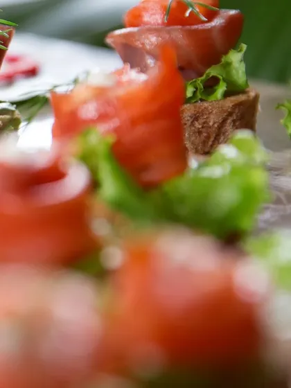 A dynamic shot of the Smoked Salmon Canapés, emphasizing the layers of flavour and texture in each bite. Perfect for corporate events and private celebrations.