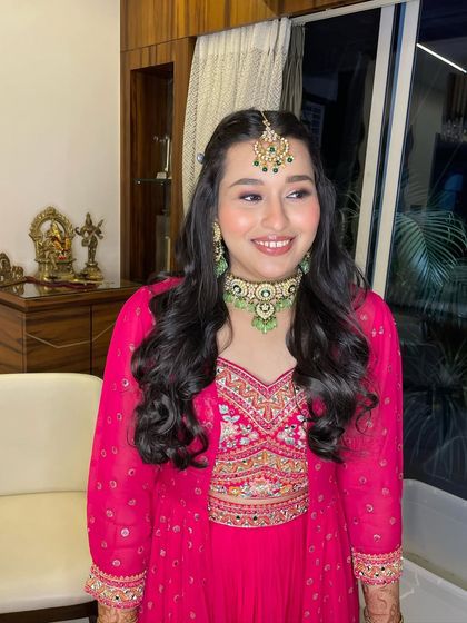 An engagement stunner in vibrant pink. This no-filter look is all about dewy skin and a happy glow.