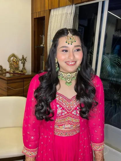 An engagement stunner in vibrant pink. This no-filter look is all about dewy skin and a happy glow.