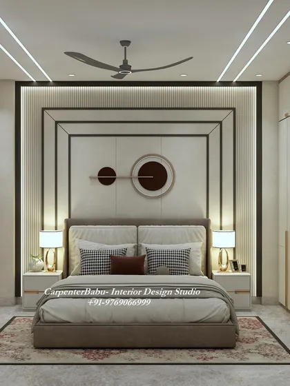 The headboard wall in this guest room is a statement in itself, with a geometric design and modern circular art. The design is sophisticated and welcoming.