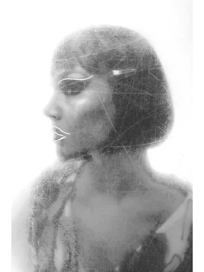 A creative black and white portrait with graphic elements. The scratched texture and the drawn-on white lines add an artistic, illustrative layer to the photograph.