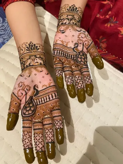 A royal peacock design with a modern twist. The peacock is framed by a sun-like halo, giving it a powerful and artistic feel.