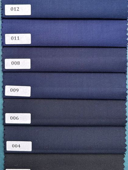 A palette of blues for your next bespoke suit. From Italian wools to luxurious silks, our curated collection is where your sartorial story begins.