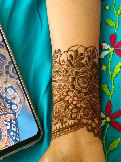 A side by side of the reference photo and my recreation. I always aim to match the inspiration while adding my own artistic touch.