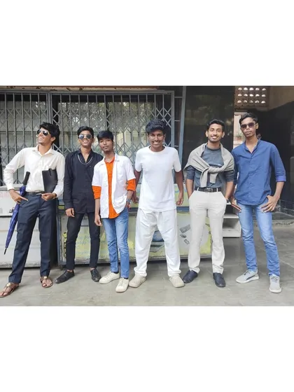 The boys' group showing off their Bollywood-themed attire.