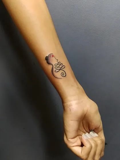 A minimalist and artistic tribute to a mother. This design uses the Devanagari script for "Maa" (Mother) in a creative and symbolic way.