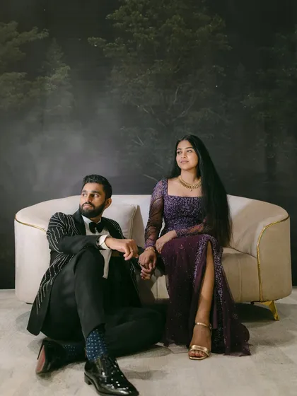 A fine-art portrait capturing a couple's distinct yet complementary energies. She brings the lightness, he brings the calm, and together they create a perfect, harmonious balance against a moody, enchanting backdrop.
