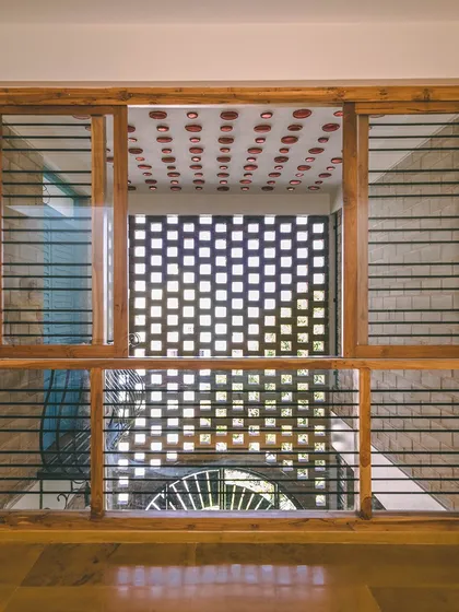 This window demonstrates Symmetry. The design of the jali and the window frame are mirrored, creating a sense of order and balance.