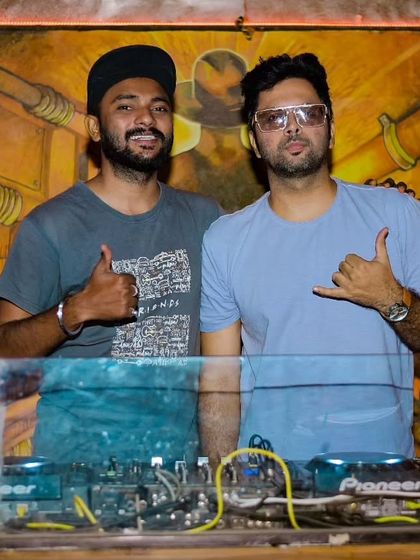 Collaborating with another DJ behind the console. I often work with other talented artists to make the night even bigger and better.