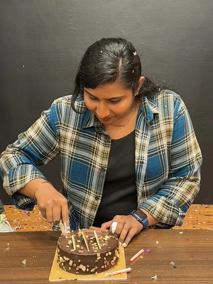 The birthday girl cutting her cake at the studio. It's a joy to celebrate these milestones with my students.