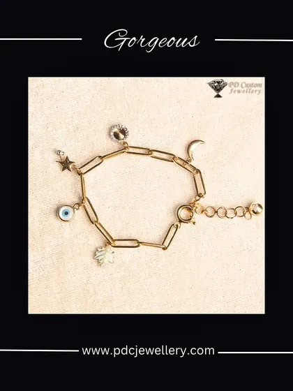 A gorgeous evil eye charm bracelet. This stylish piece is not only a fashion statement but also a symbol of protection, making it a thoughtful and trendy gift.