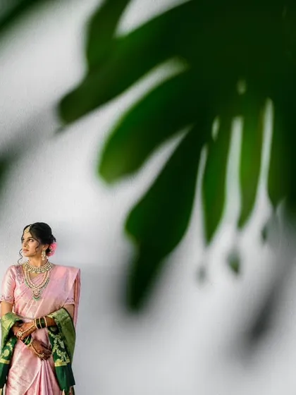 Another artistic take on a bridal portrait. I used the large leaf shadow to create a minimal and modern composition, with the stunning bride, Srushti, as the beautiful focal point.