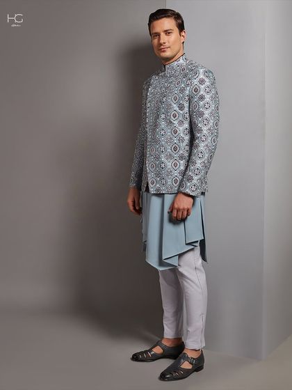 The full silhouette of the printed jacket, paired with an asymmetrical kurta, demonstrates my approach to modern, elevated ethnic wear.