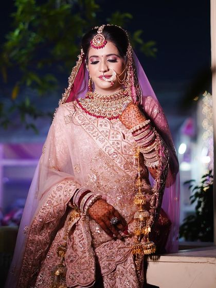 This beautiful ombre lehenga in shades of pink is so unique. I kept the makeup soft and glowing to let the outfit shine.