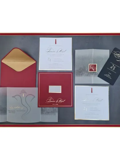 For a chic and modern celebration in New York City, we created this glamorous invitation suite. The design features the iconic NYC skyline rendered with dazzling gold foil on a bold red, black, and white color palette for a truly sophisticated feel.