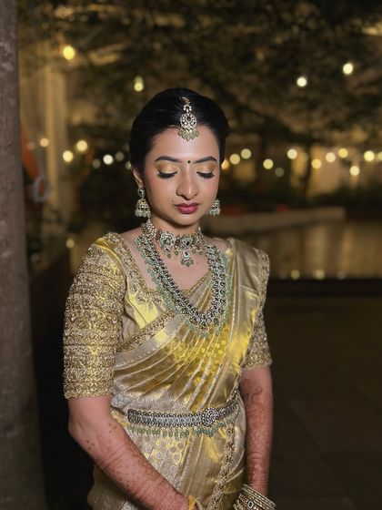 An eyes-closed shot to showcase the golden, shimmery eyeshadow.