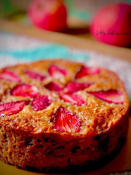 A simple and elegant apple and strawberry whole wheat cake. The sweetness of the apple and tartness of the strawberry make a wonderful combination.