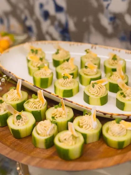 A platter of our Thecha Cucumber Cups. This innovative appetizer combines the coolness of cucumber with the spicy kick of Maharashtrian thecha.