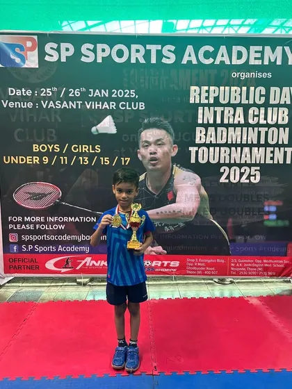 The U11 boys' winner, Vihaan Gaikwad, with his championship trophy.