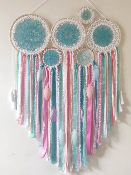 Living in a pastel dream. This beautiful cluster dreamcatcher combines shades of pink and blue for a soft, ethereal look.