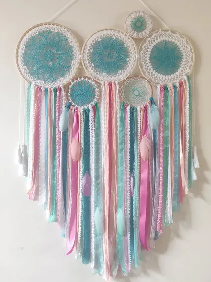 Living in a pastel dream. This beautiful cluster dreamcatcher combines shades of pink and blue for a soft, ethereal look.