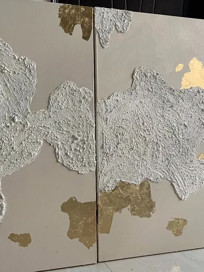 Another view of the gold leaf and texture panels. When hung together, they create a large, cohesive installation that is both modern and timeless.