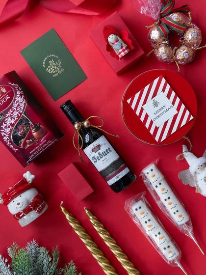 The contents of the Christmas hamper laid out, ready to be assembled into a beautiful gift.