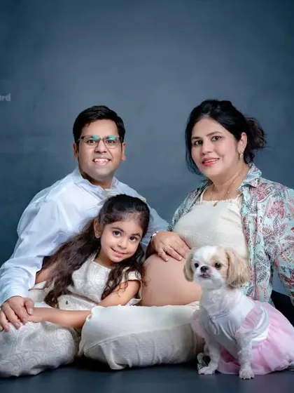 From three to four, with a furry friend in tow. This is what family is all about. We love creating these full family maternity portraits that include older siblings and pets, capturing the excitement of everyone involved.