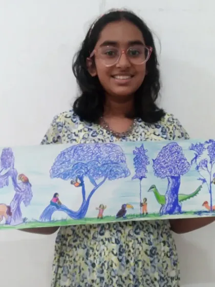Here is Biya, a 7th standard student, holding her creative jungle drawing. This piece showcases her skill with sketch pens and her ability to create a complex, imaginative world.