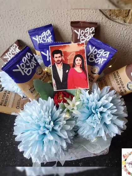 A unique bouquet made with Yoga Bars and other healthy snacks, arranged with artificial flowers. This is a great gift for a health-conscious friend.
