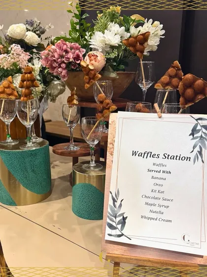 An elegant and inviting Waffles Station. Guests can customize their dessert with a variety of toppings, all served fresh and warm, making it a sweet and interactive experience.